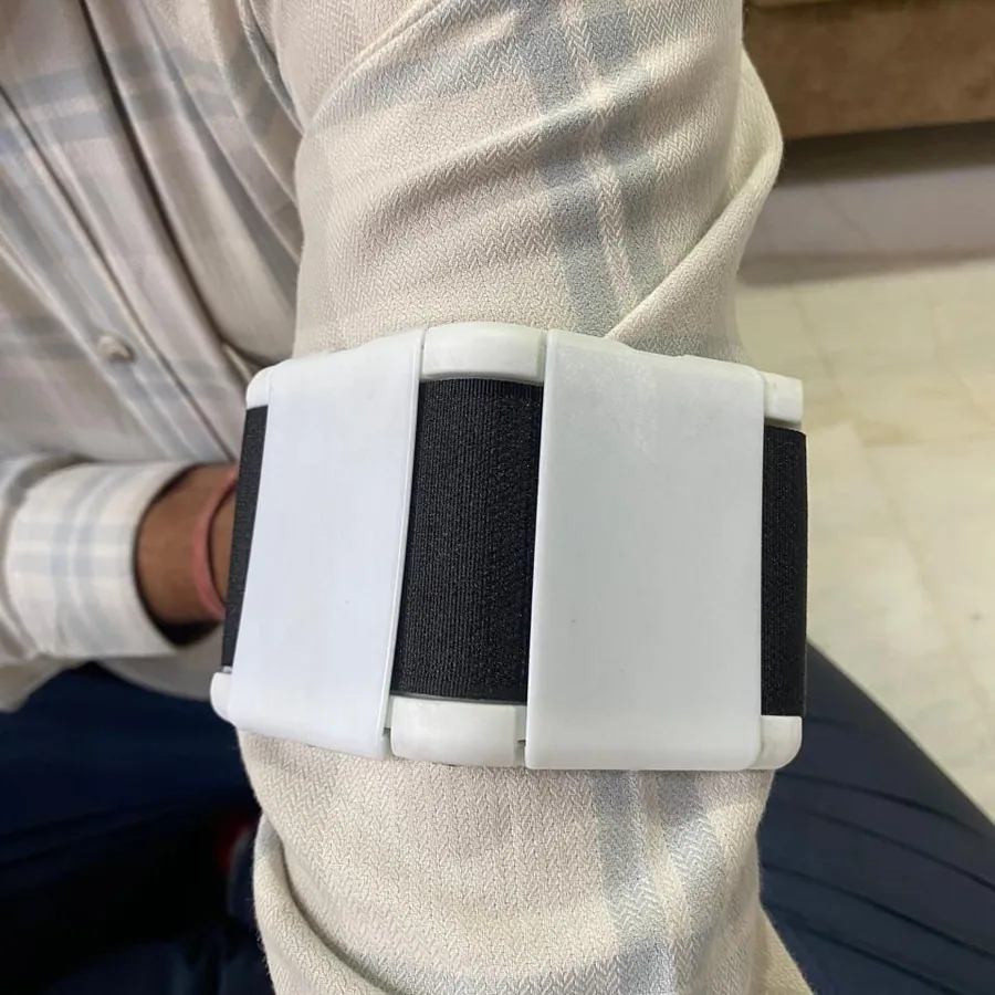 Early prototype of the grip-free fitness cuff strapped above the elbow