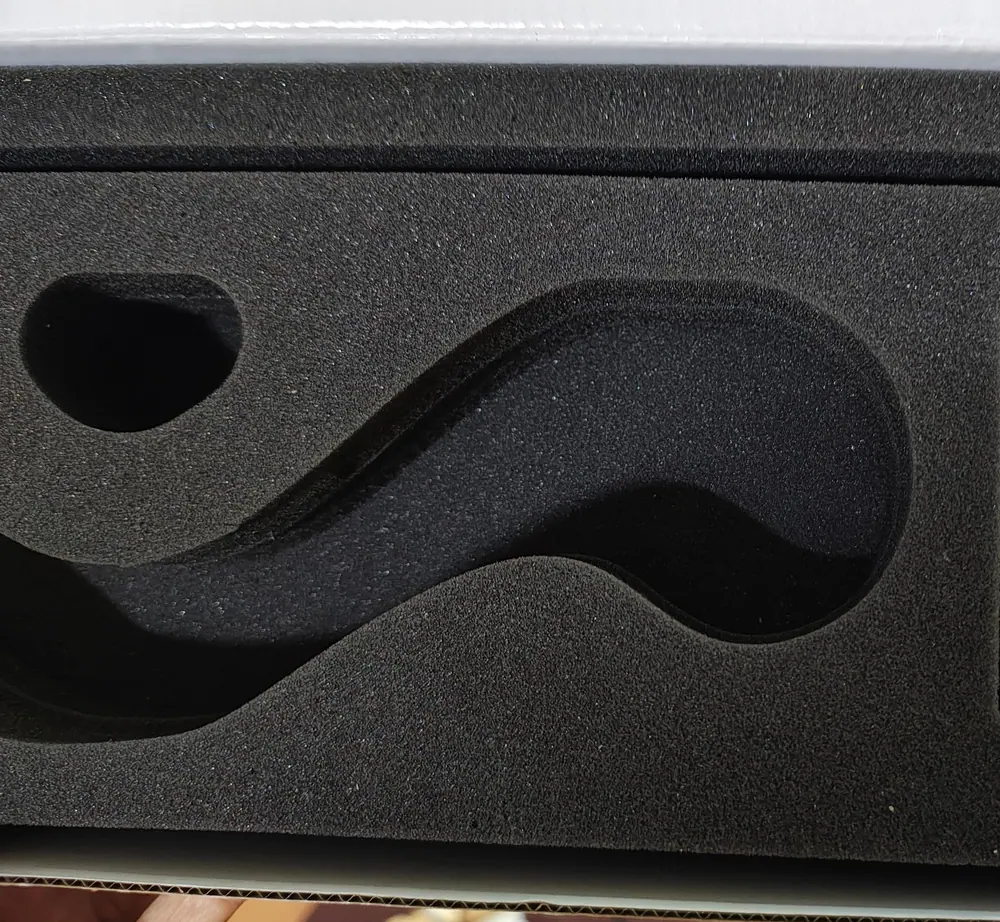 Custom foam packaging insert for a die-cast handle