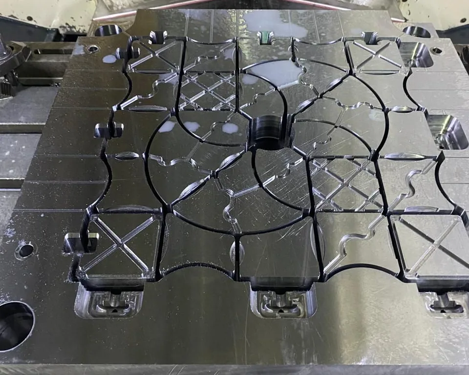 Injection mold for recycled plastic ground grids