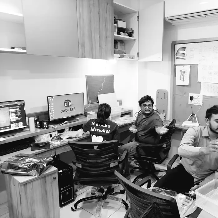 Engineers working at their desks in the CADLETE Ahmedabad design studio