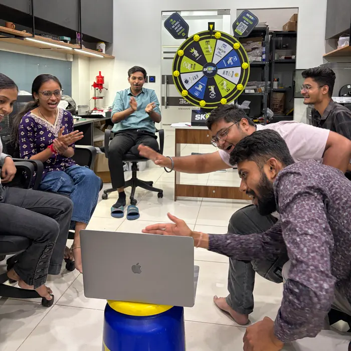 The CADLETE team celebrating together in the studio