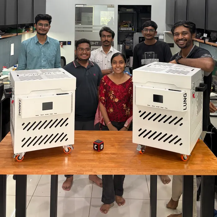 The CADLETE team posing with two finished product builds