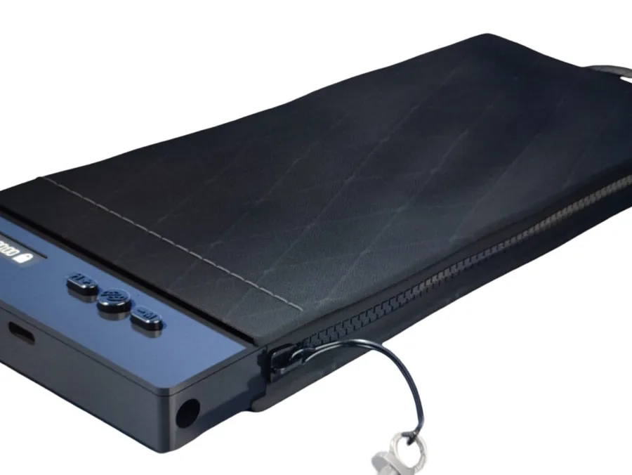 Timer-locked smart phone pouch with its electronics module and zip closure