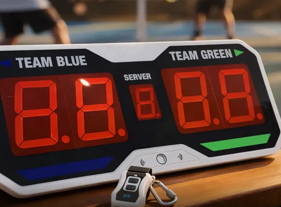 Pickleball electronic scoring unit on court-side table, built by CADLETE Designs